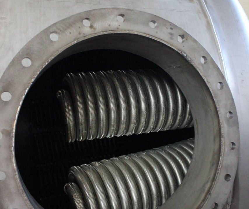 Finned coils inside the inspection flange